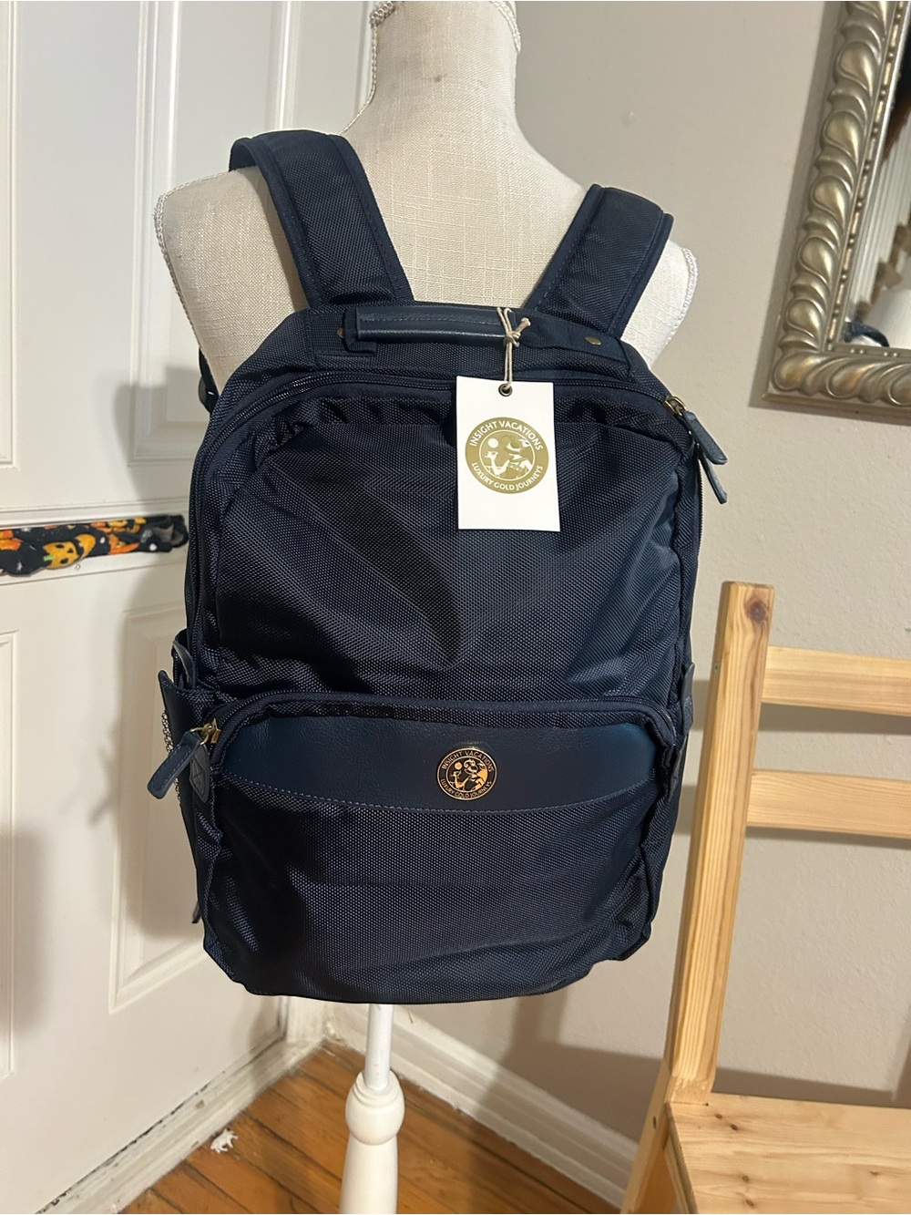 Classic Navy Men's Backpack with Gold Crest Accent